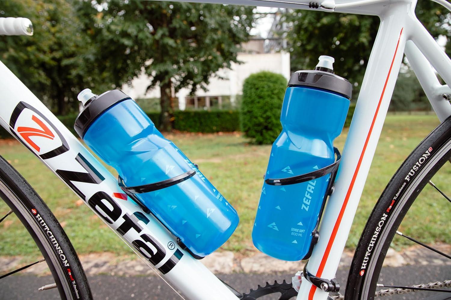 imageZEFAL Pack Sense Soft 65 Lot de Deux Bidons Velo et VTT Gourde Sport Souple et Inodore Bidon Eau Sans BPA Tetine Silicone Noir 650MLBleu Transparent
